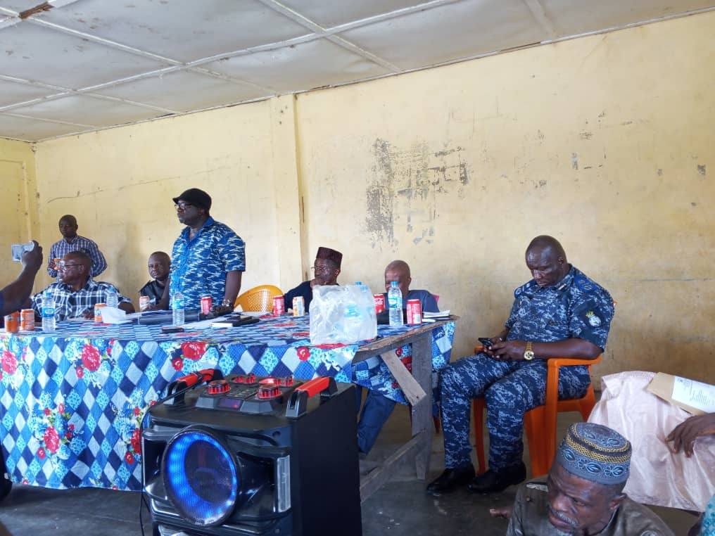 SANAD staff and local government, police, and traditional authority representatives seated together at a community forum