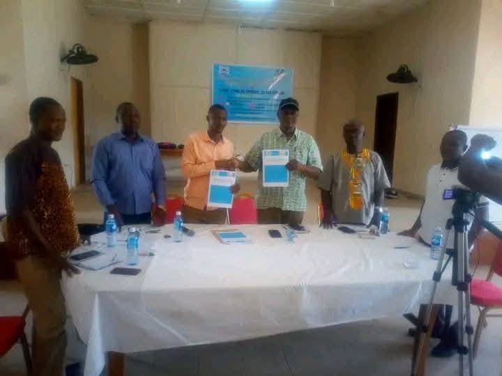 SANAD representatives formalizing a partnership agreement at a signing ceremony